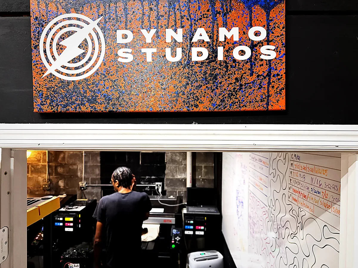 Dynamo Studios sign hanging over the Humanitees print room